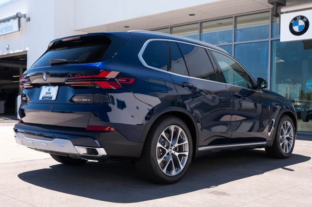 New 2026 Tanzanite Blue II Metallic BMW xDrive50e image 10