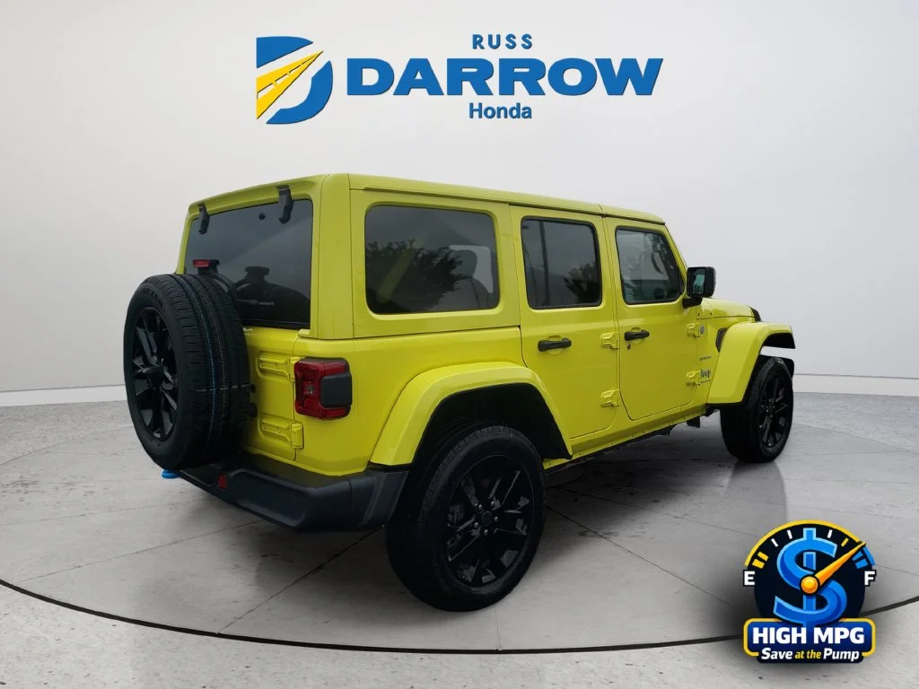 Used 2024 Yellow Jeep Sahara 4xe image 5