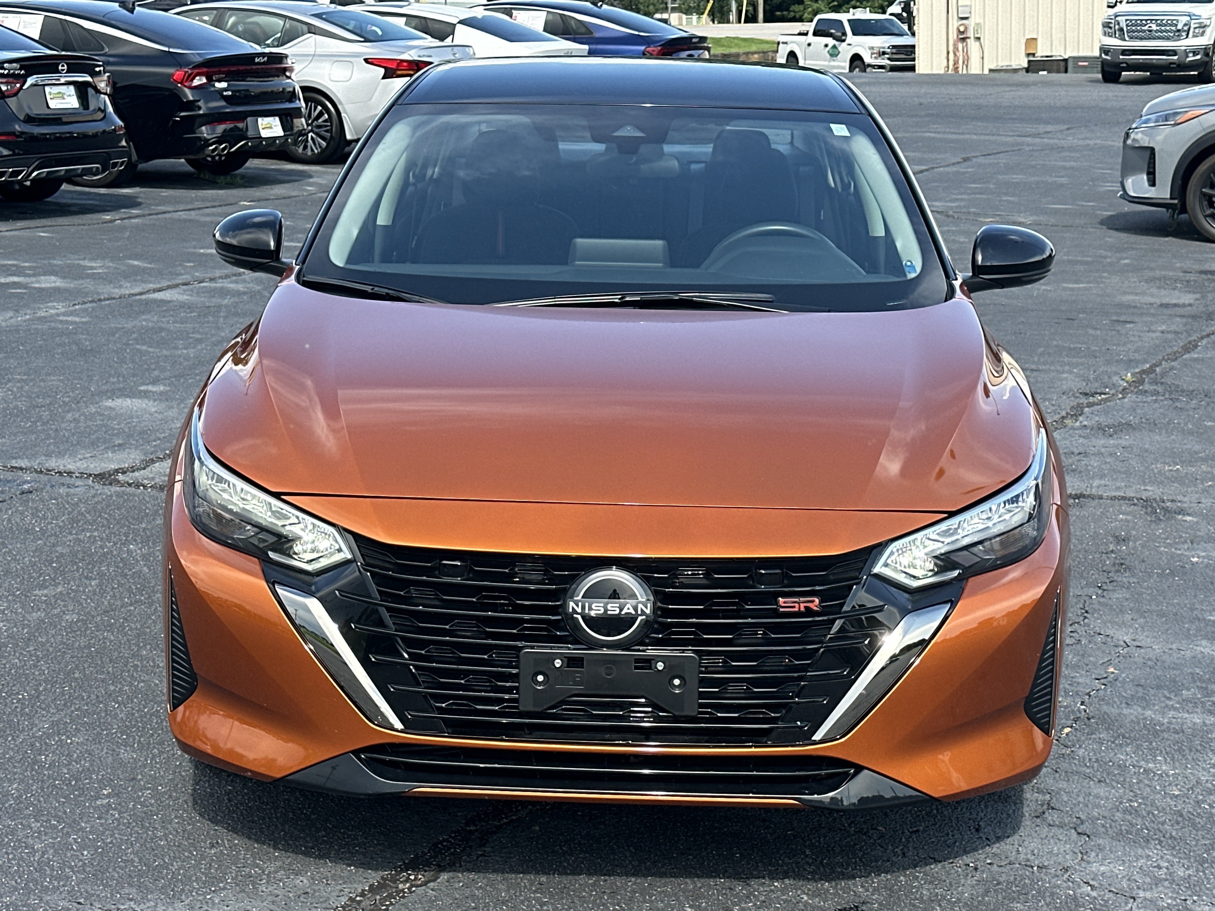 Used 2024 Monarch Orange Metallic/Super Black Nissan SR image 2