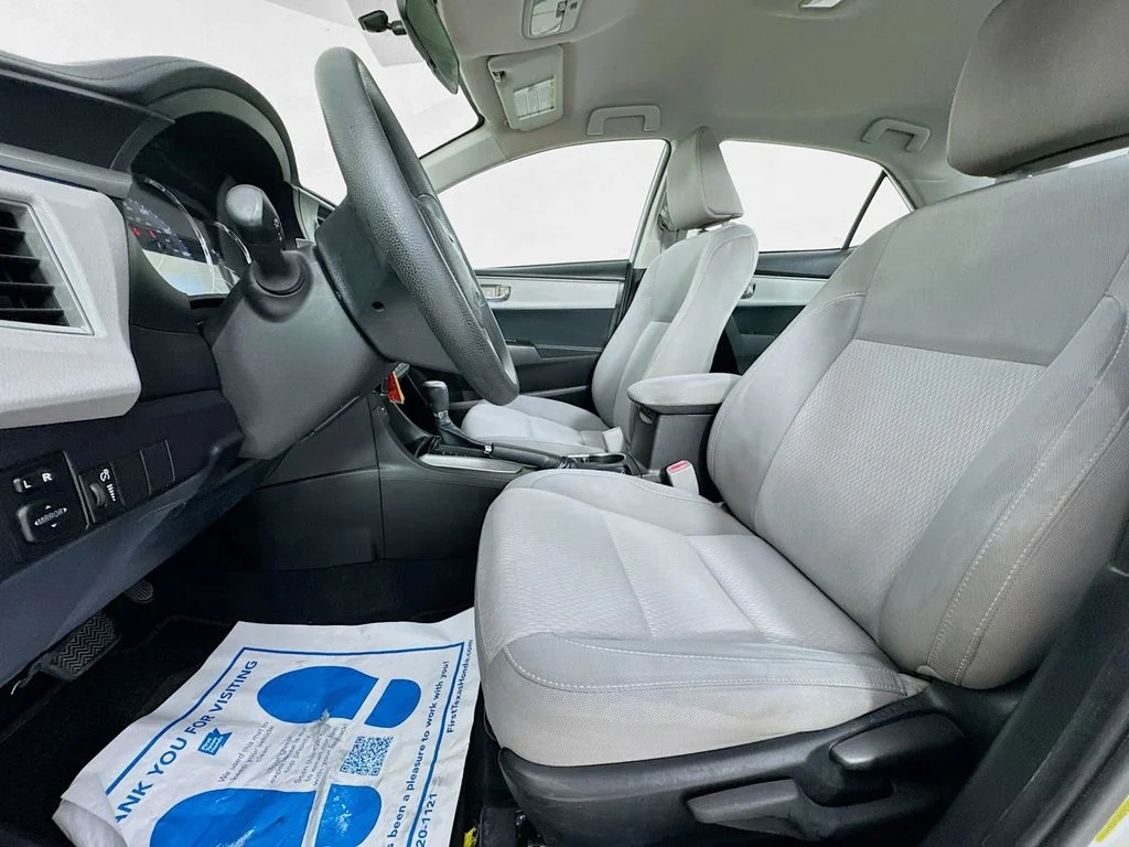 Used 2015 Super White Toyota LE image 23