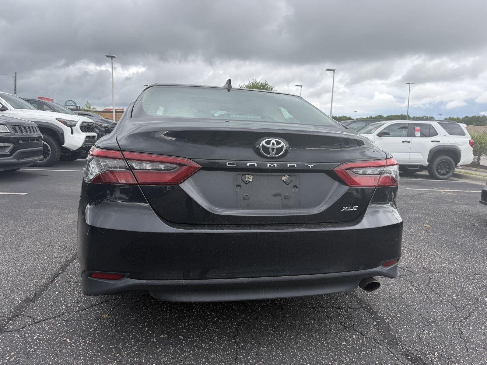 Used 2023 Midnight Black Metallic Toyota XLE image 6