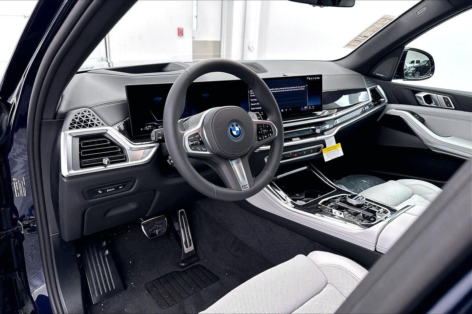 New 2026 Tanzanite Blue II Metallic BMW xDrive50e image 23