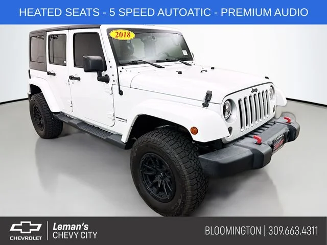 Used 2018 White Jeep Unlimited Sahara image 1
