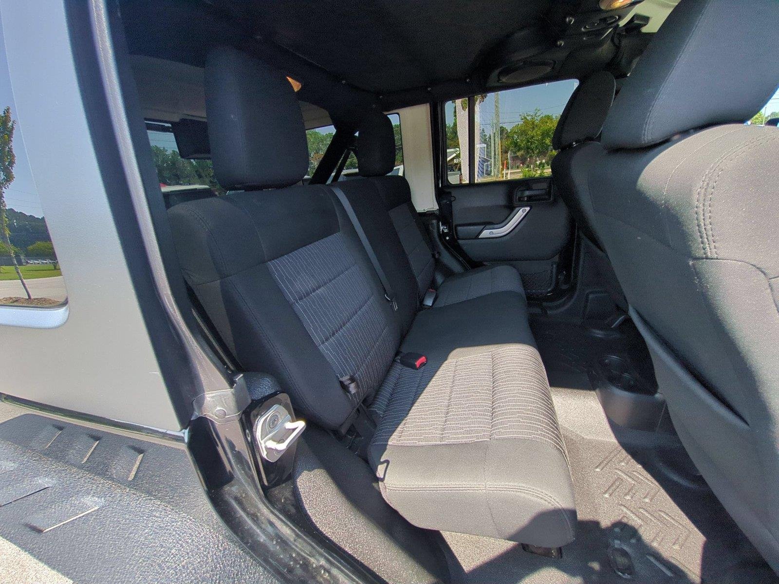Used 2012 Black Clearcoat Jeep Sahara image 30