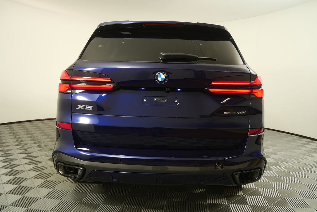 Used 2026 Tanzanite Blue II Metallic BMW sDrive40i image 4