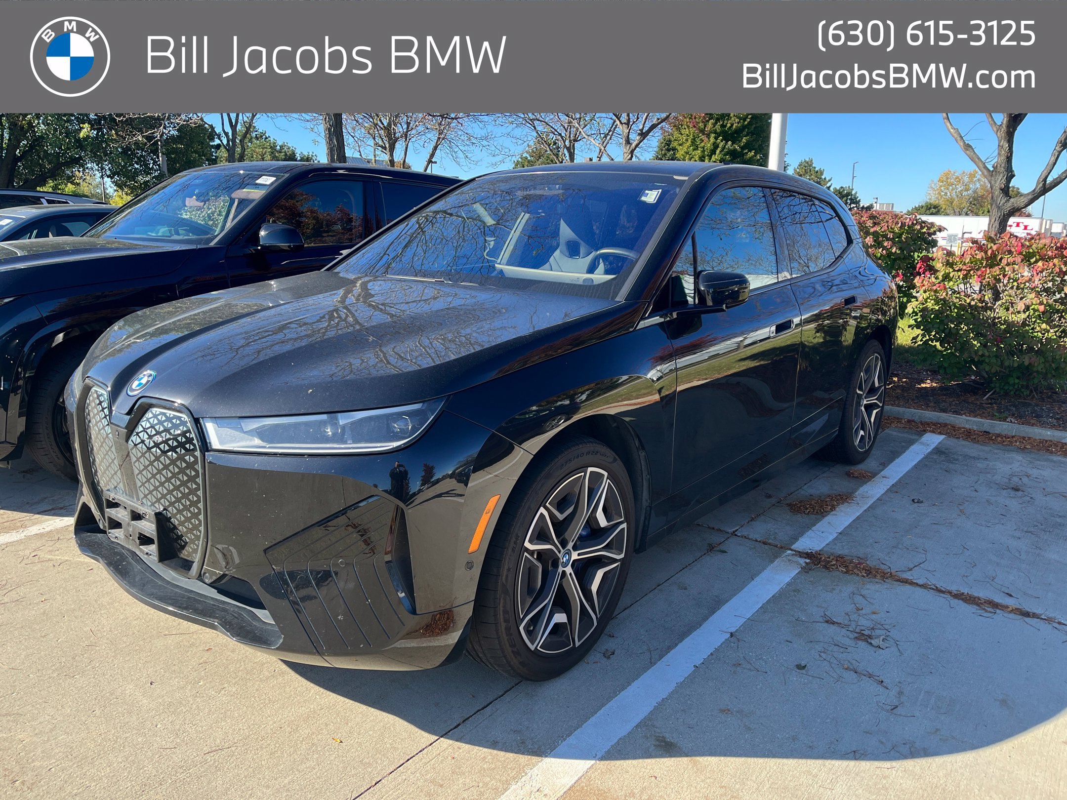 Certified Used 2024 Black Sapphire Metallic BMW xDrive50 image 1
