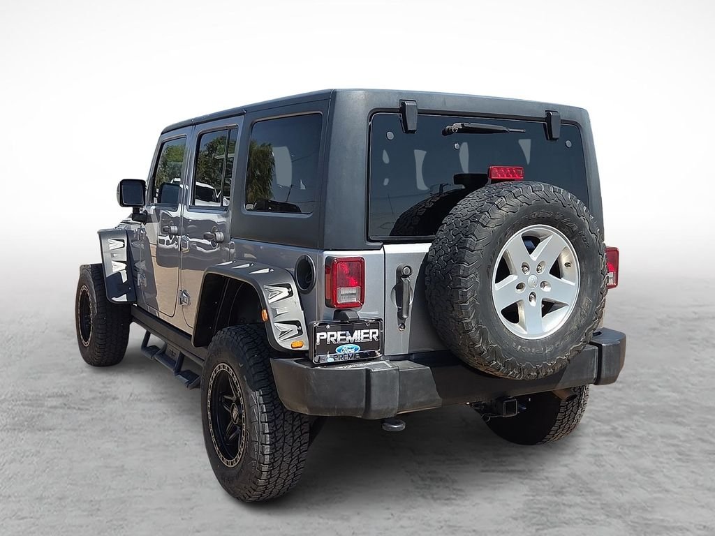 Used 2016 Billet Silver Metallic Clearcoat Jeep Unlimited Sport image 8