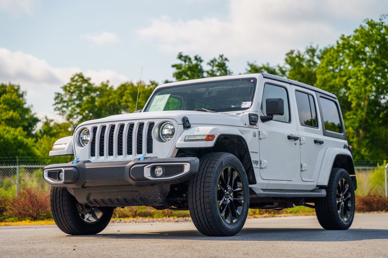Used 2023 White Jeep Sahara 4xe image 2