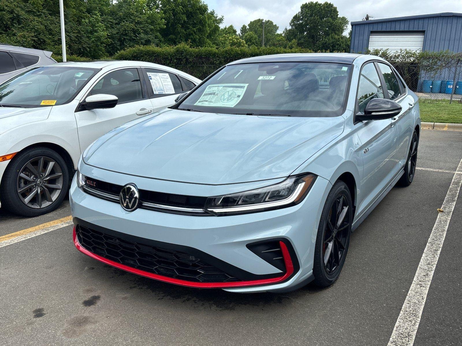 New 2026 Monument Gray w/Deep Black Roof Volkswagen Autobahn image 2