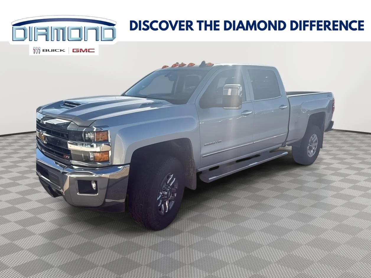 Used 2019 Silver Ice Metallic Chevrolet LTZ image 1