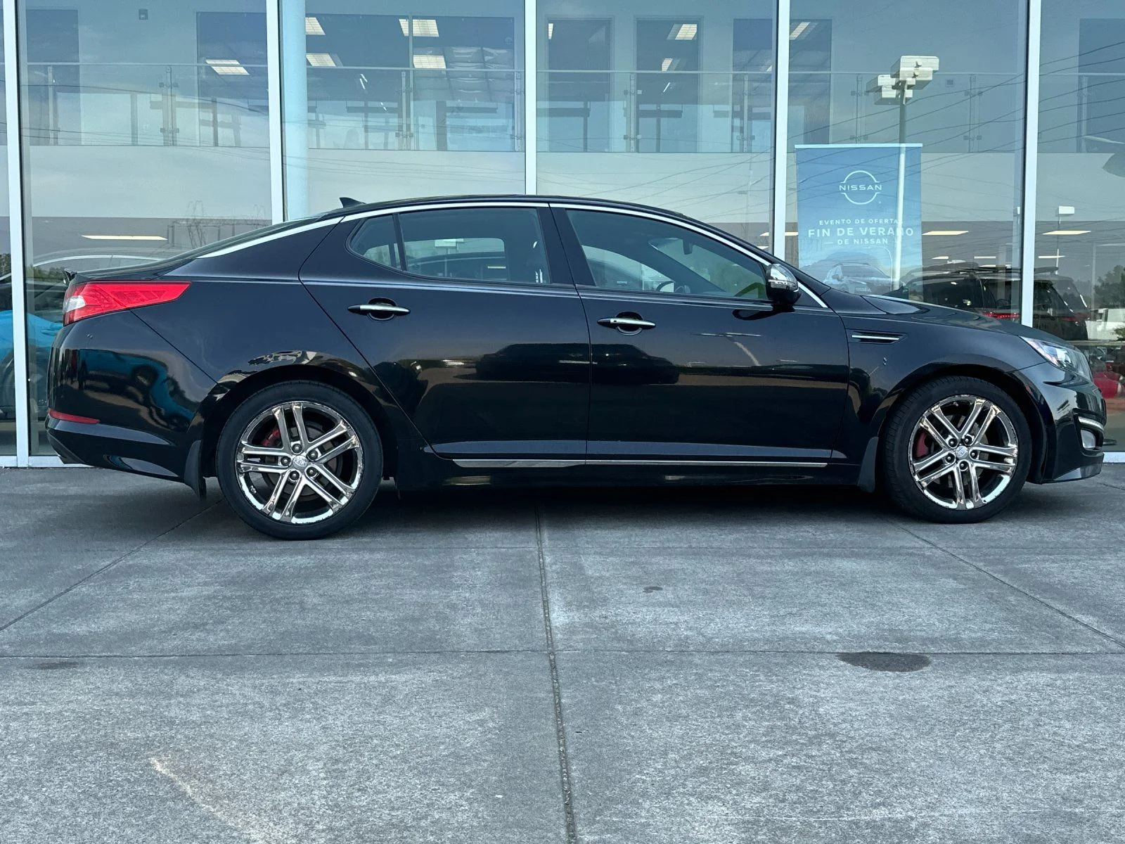 Used 2013 Ebony Black Kia SX image 2