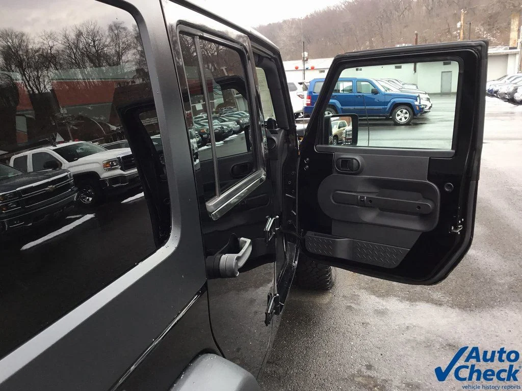 Used 2010 Black Jeep Unlimited Sport image 34