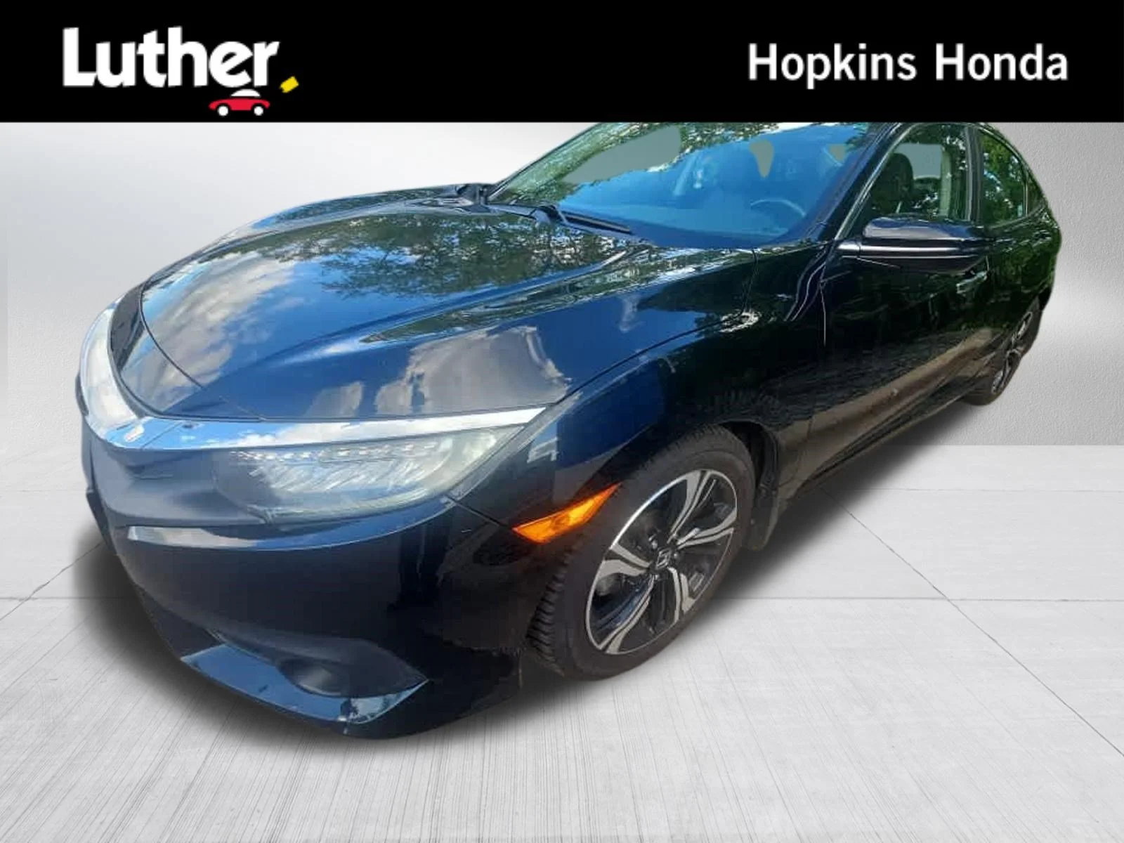 Used 2016 Crystal Black Pearl Honda Touring image 1