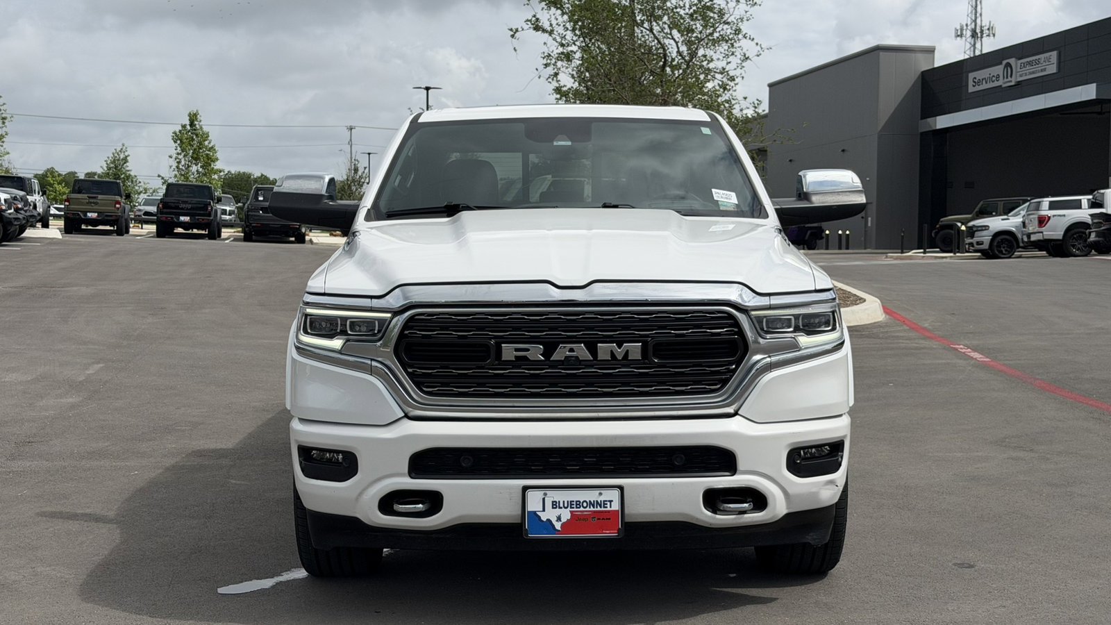 Certified Used 2024 Ivory White Tri-Coat Pearlcoat Ram Limited image 2