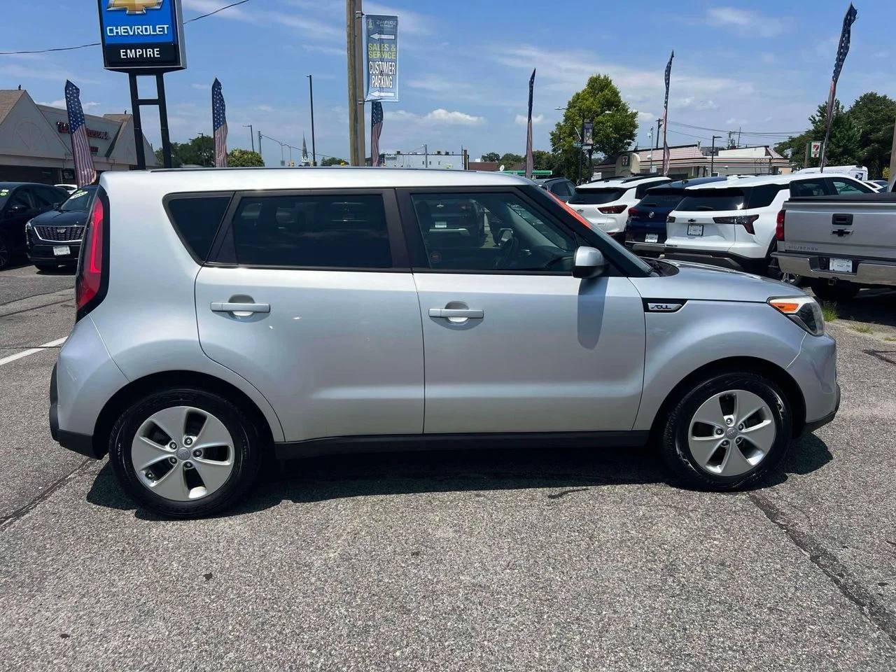Used 2016 Bright Silver Kia Base image 4