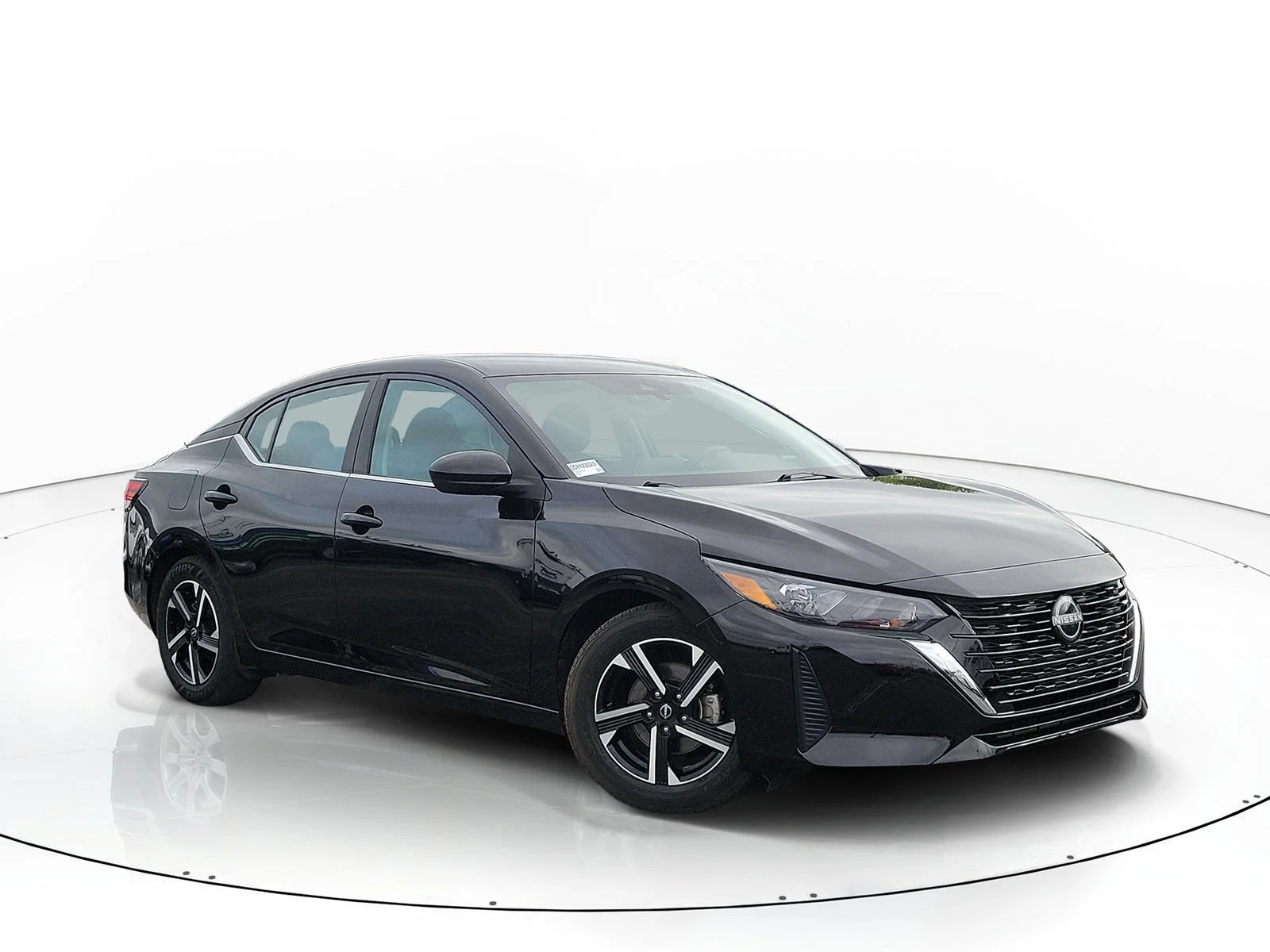 Used 2024 Super Black Nissan SV image 1