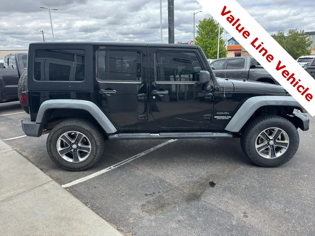 Used 2011 Black Clearcoat Jeep Sport image 6
