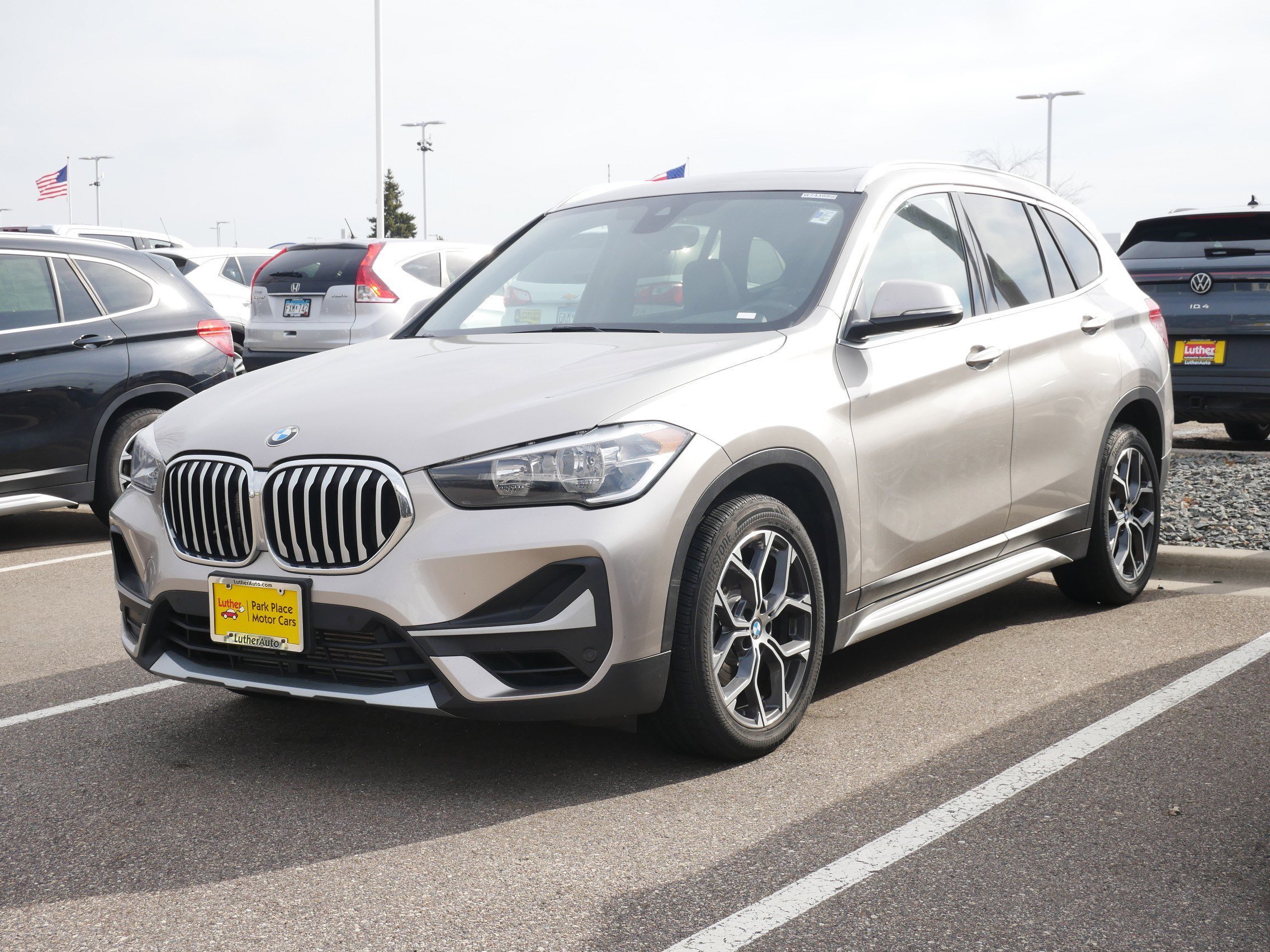 Used 2021 BMW X1 28i with VIN WBXJG9C08M3M79985 for sale in Brooklyn Center, Minnesota