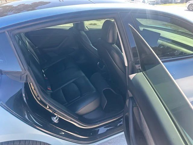 Used 2021 Solid Black Tesla Standard Range Plus image 8