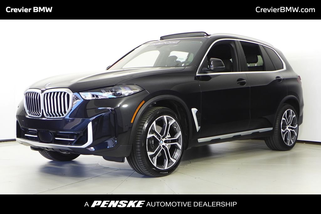 Certified Used 2024 Black Sapphire Metallic BMW sDrive40i image 1