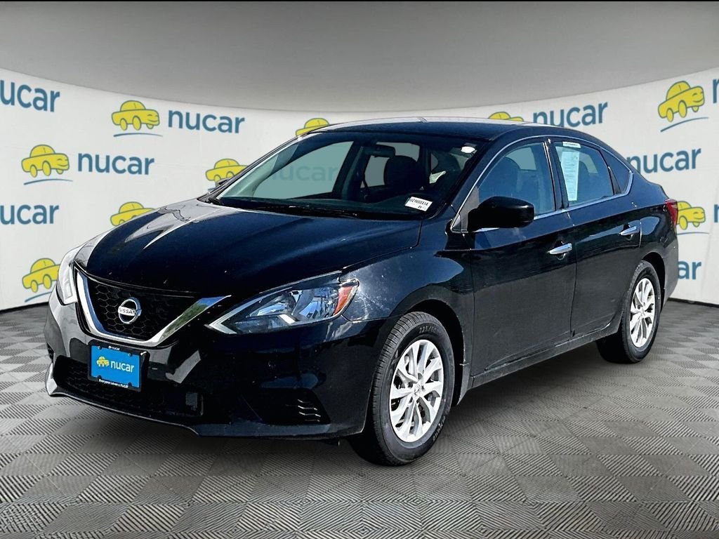 Used 2019 Super Black Nissan SV image 3