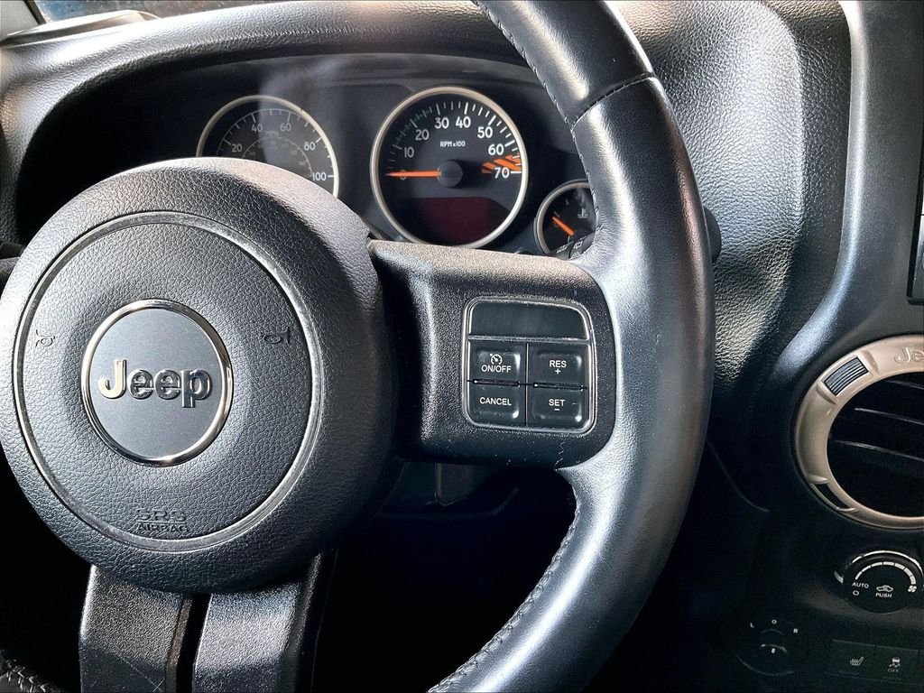 Used 2017 Black Jeep Unlimited Sahara image 23
