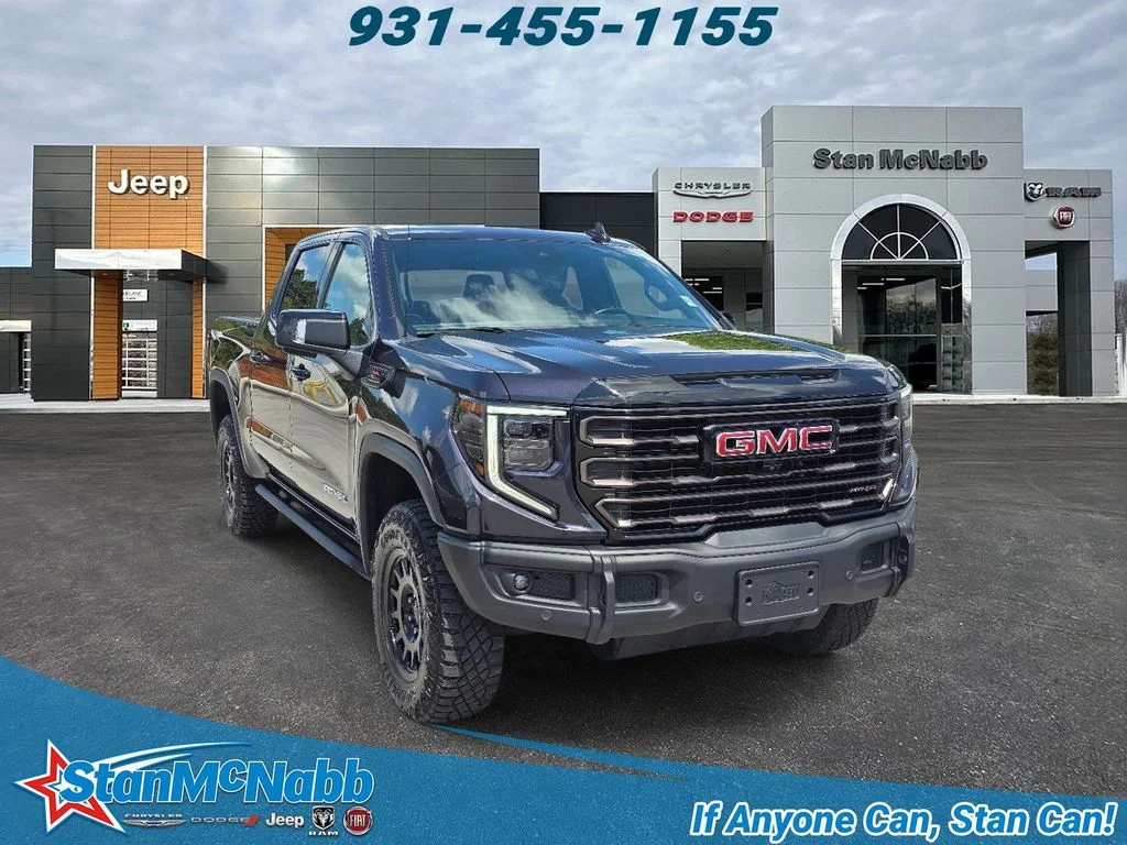 Used 2023 Titanium Rush Metallic GMC AT4X image 1