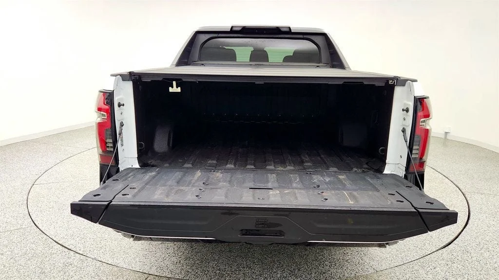 Used 2025 Summit White Chevrolet e4WD Crew Cab Max Range RST w/ Hard Folding Truck Bed Cover image 23
