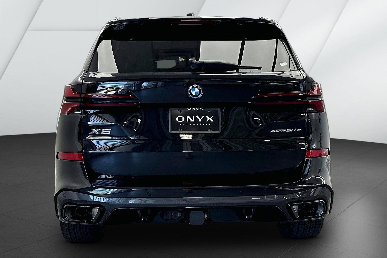 New 2026 Black Sapphire Metallic BMW xDrive50e image 6