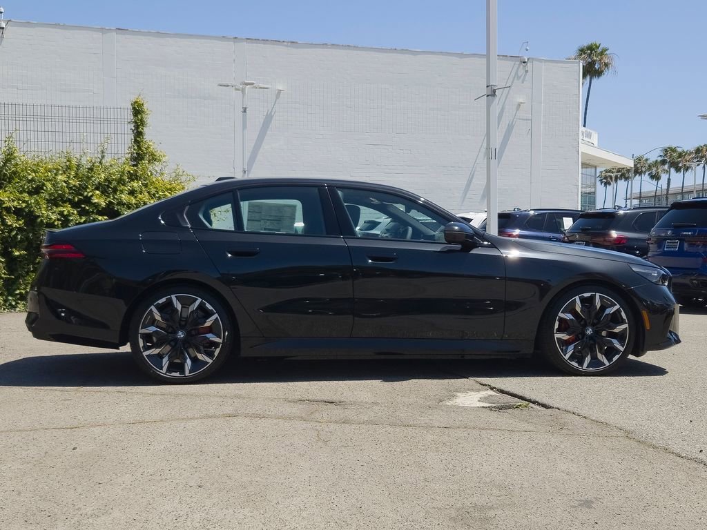 New 2026 Black Sapphire Metallic BMW 550e xDrive image 4