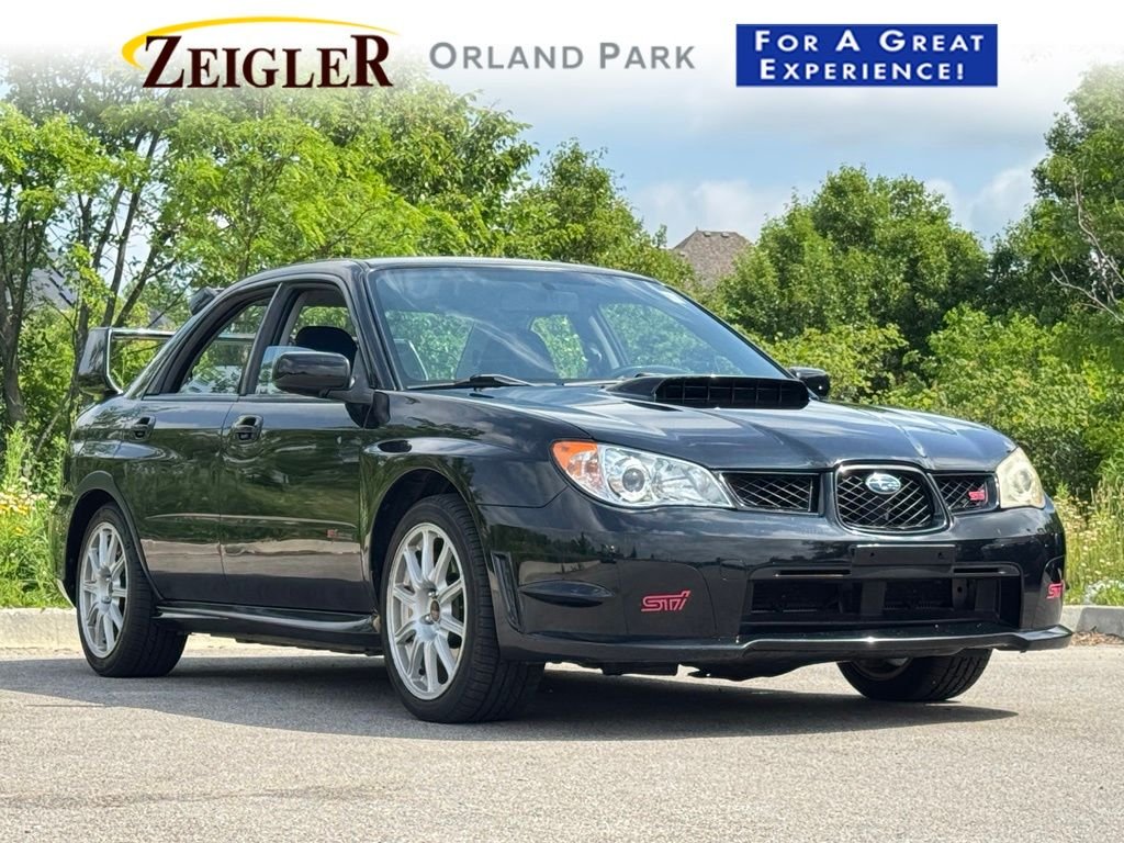 Used 2007 Black Subaru WRX STi image 1