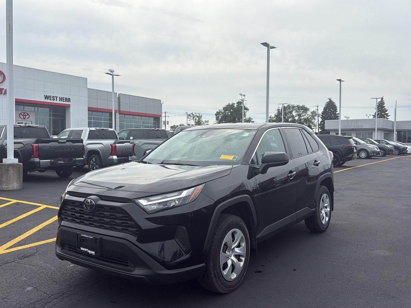 Used 2024 Midnight Black Metallic Toyota LE image 3