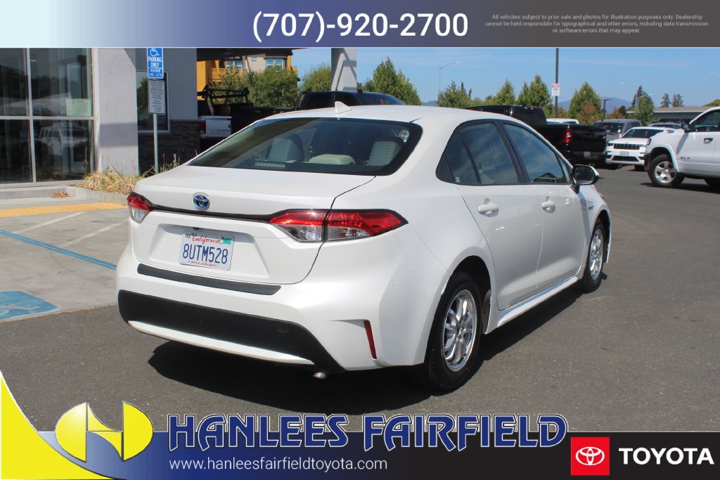 Used 2021 White Toyota LE image 7