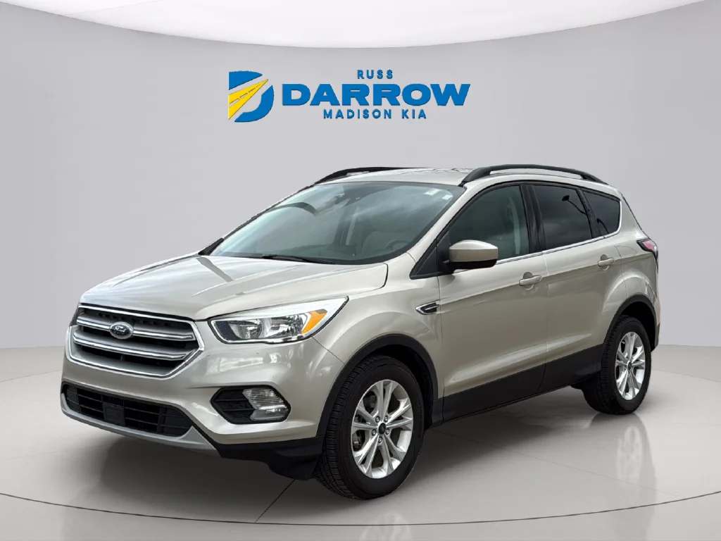 Used 2018 White Gold Metallic Ford SE image 1