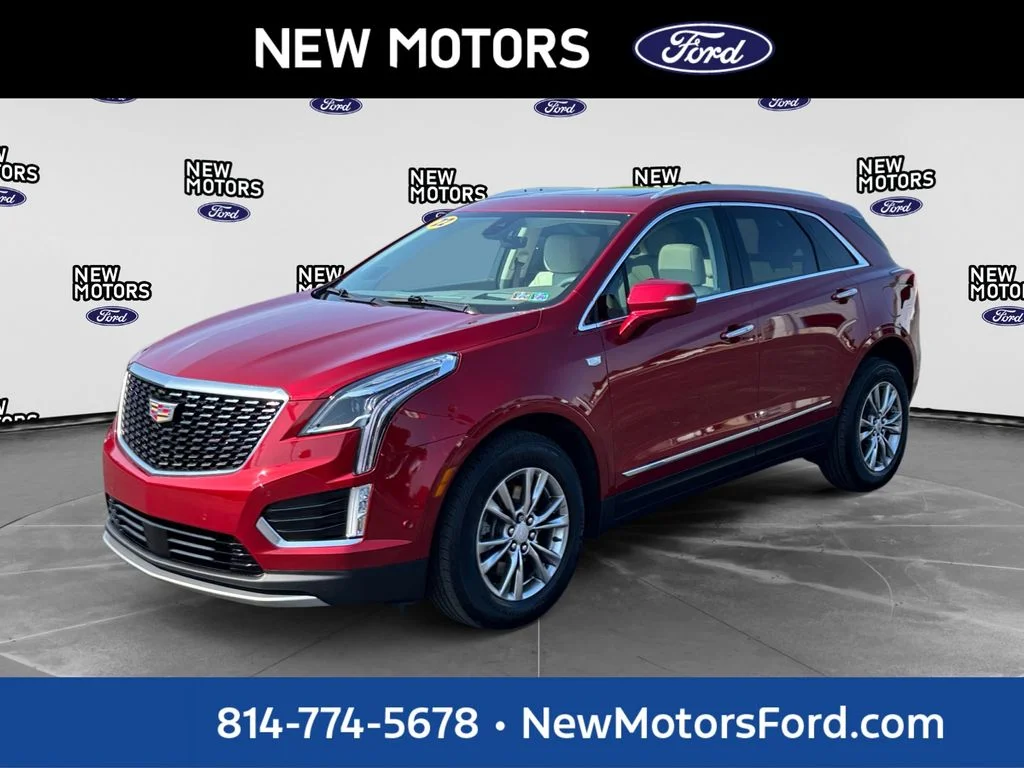 Used 2022 Infrared Cadillac Premium Luxury image 1