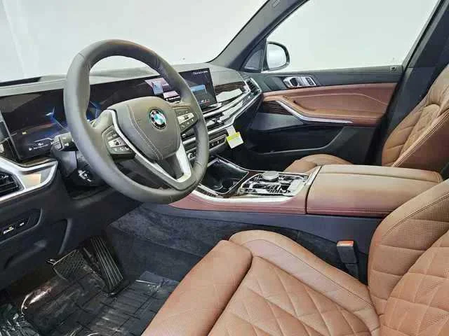 Certified Used 2026 Black Sapphire Metallic BMW xDrive40i image 2
