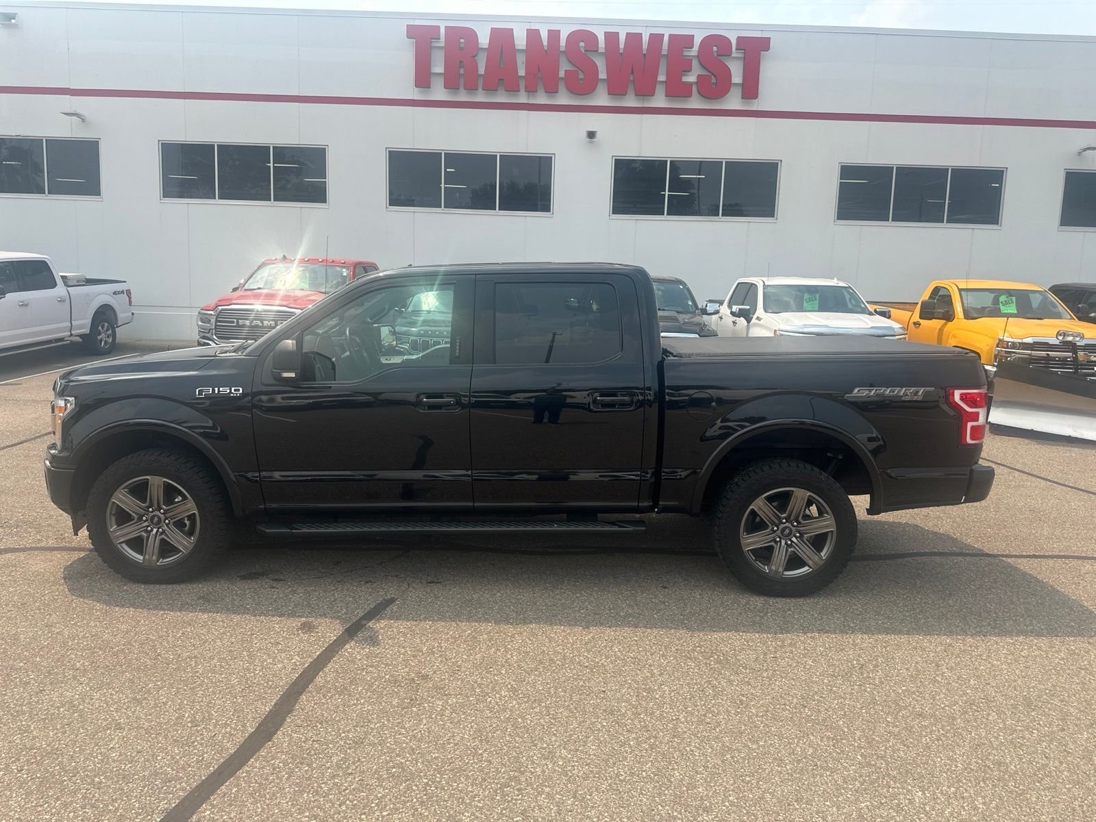 Used 2020 Ford F-150 XLT with VIN 1FTEW1E40LKF09813 for sale in Minneapolis, Minnesota