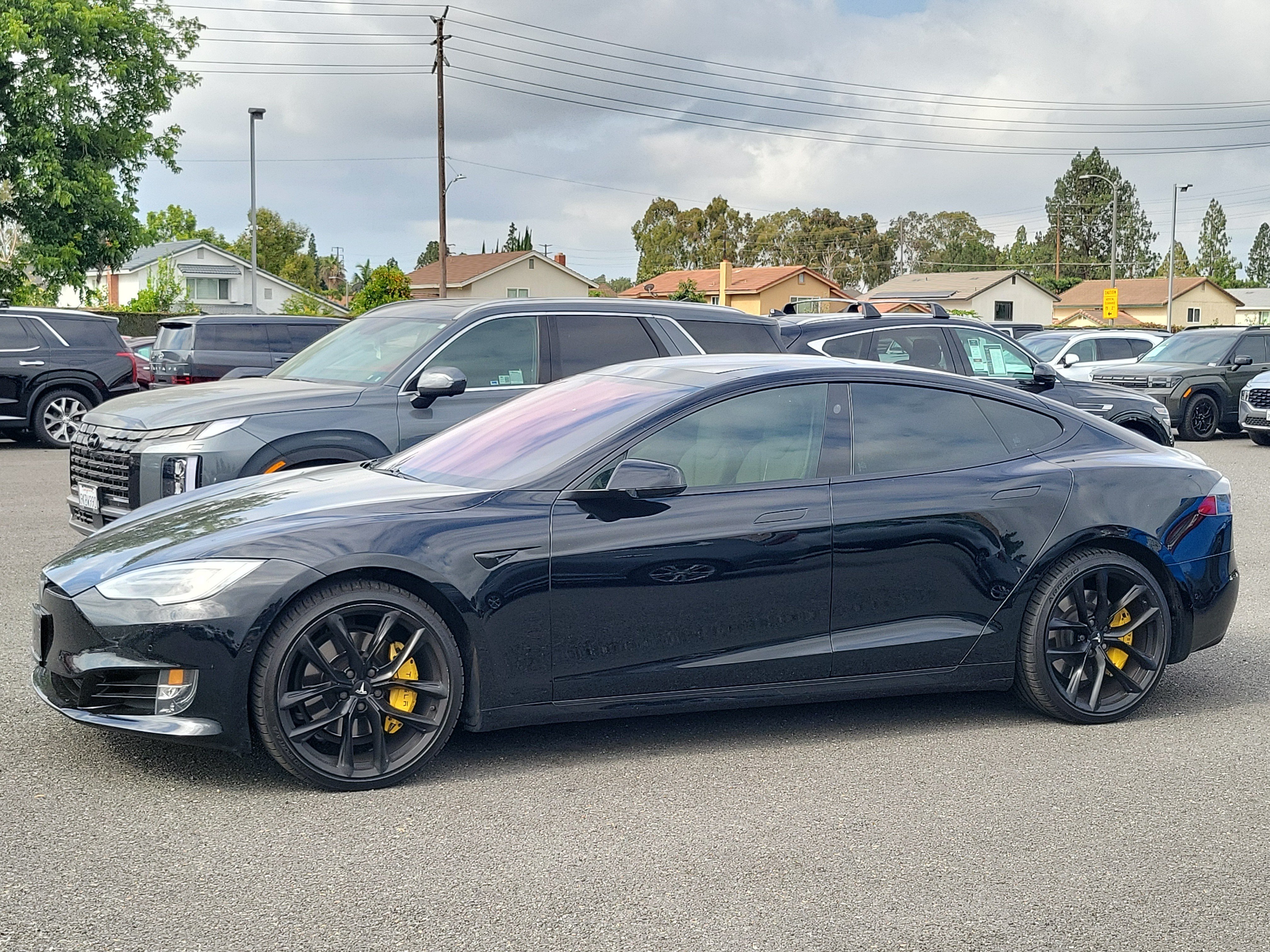 Used 2018 Solid Black Tesla 75D image 1