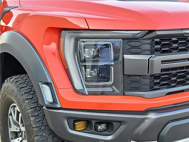 Used 2023 Orange Ford Raptor 4x4 SuperCrew Cab 5.5 ft. box 145 in. WB image 6