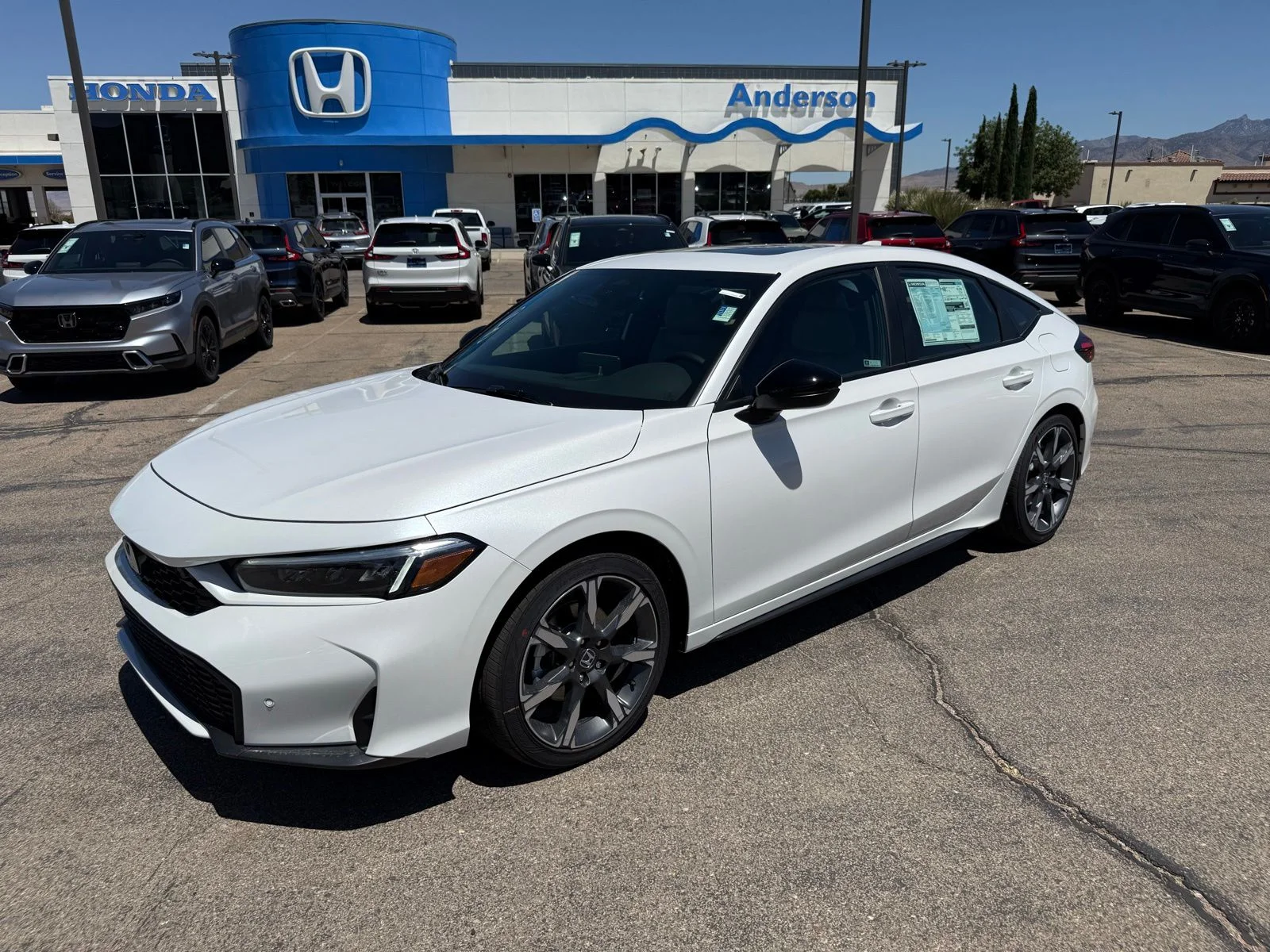2026 Honda Civic Sport Touring Hybrid CVT's photo