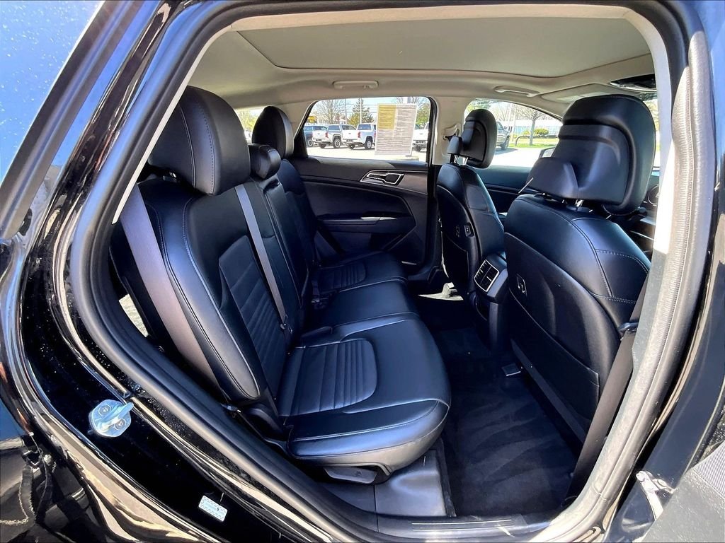 Used 2023 Ebony Black Kia SX-Prestige image 16