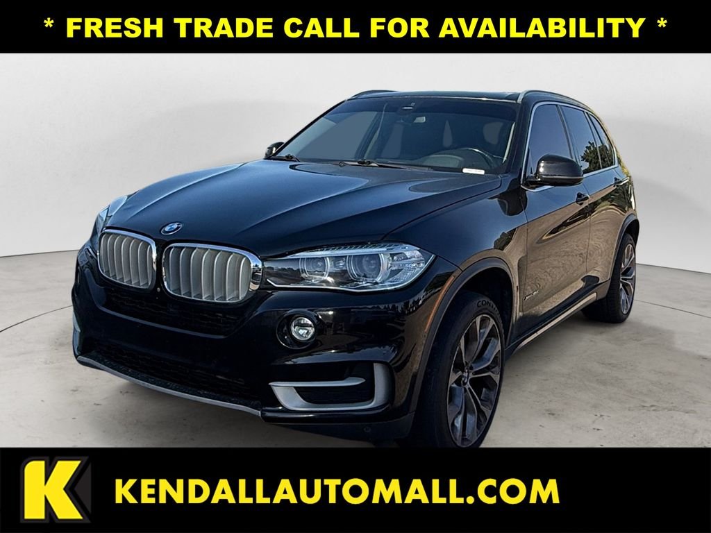 Used 2015 Black BMW xDrive35i image 1