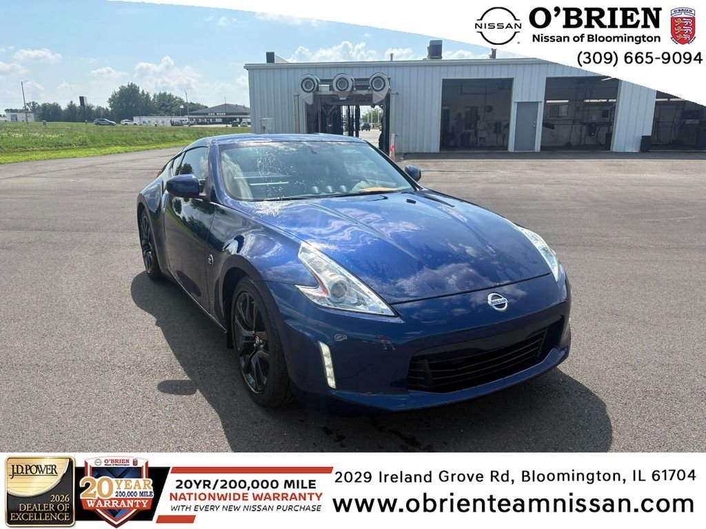 Used 2016 Deep Blue Pearl Nissan Touring image 1