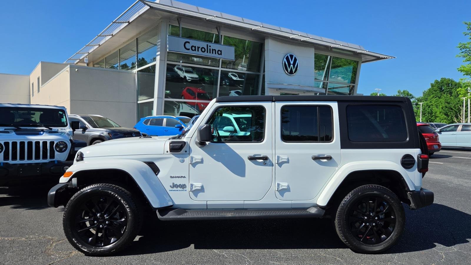 Used 2023 Jeep Wrangler 4xe Sahara 4XE with VIN 1C4JJXP65PW604350 for sale in Charlotte, NC