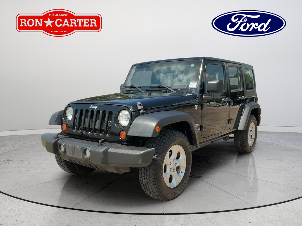 Used 2013 Black Jeep Unlimited Sport image 3