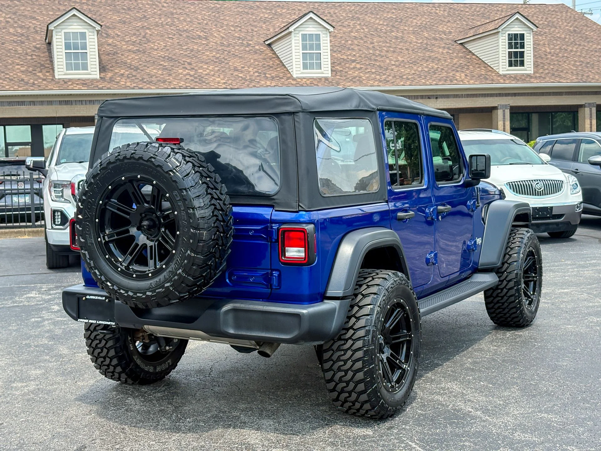 Used 2019 Blue Jeep Unlimited Sport image 11