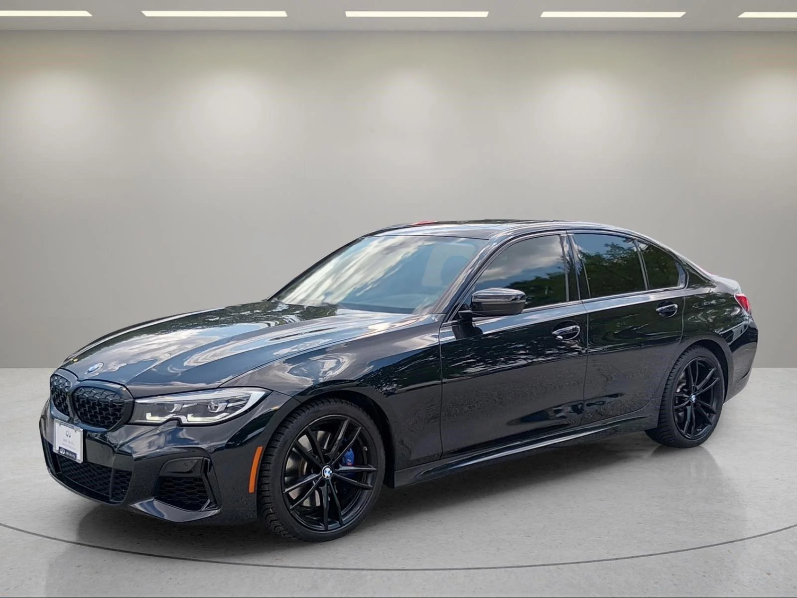 Used 2021 Black Sapphire Metallic BMW M340i xDrive image 1