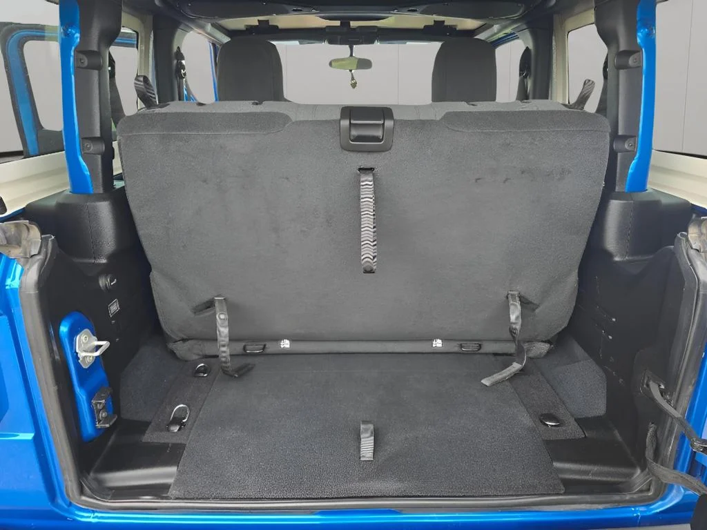 Used 2024 Hydro Blue Pearlcoat Jeep Sport image 9