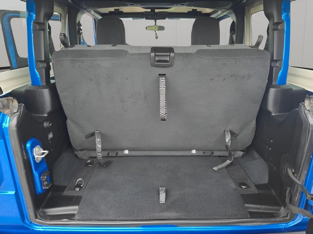 Used 2024 Hydro Blue Pearlcoat Jeep Sport image 9