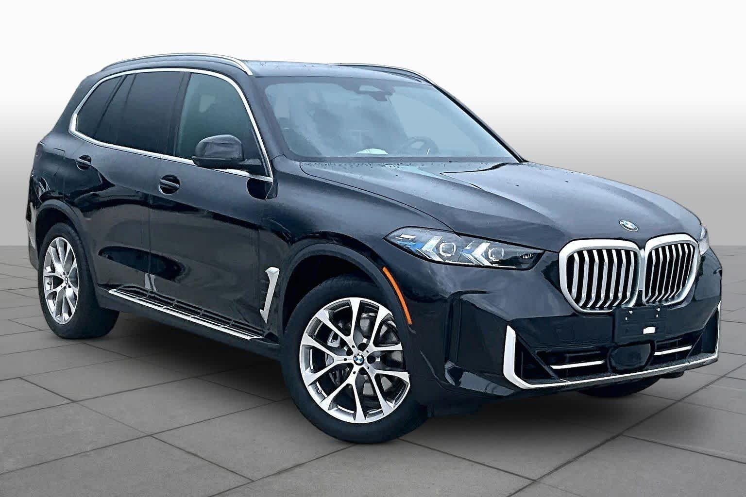Used 2026 Black Sapphire Metallic BMW sDrive40i image 2
